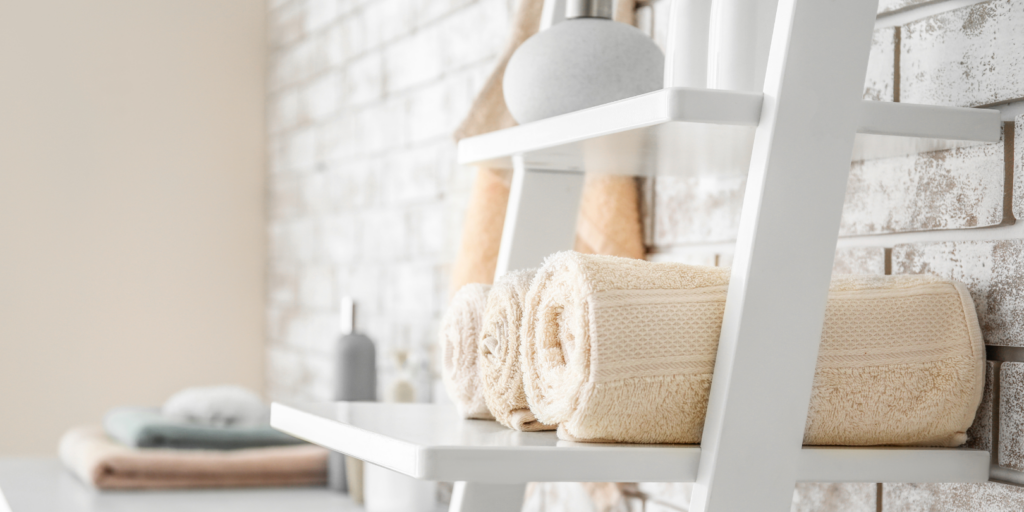 Rolled Towels on Shelf in Bathroom